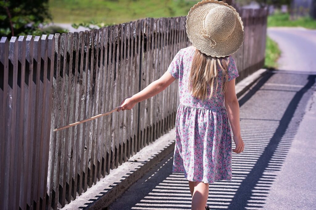 summer, dress, hat, girl, child, fence, strolling, walking, alone, little girl, day dress, nature, fashion, style, away, wooden fence, childhood, outdoors