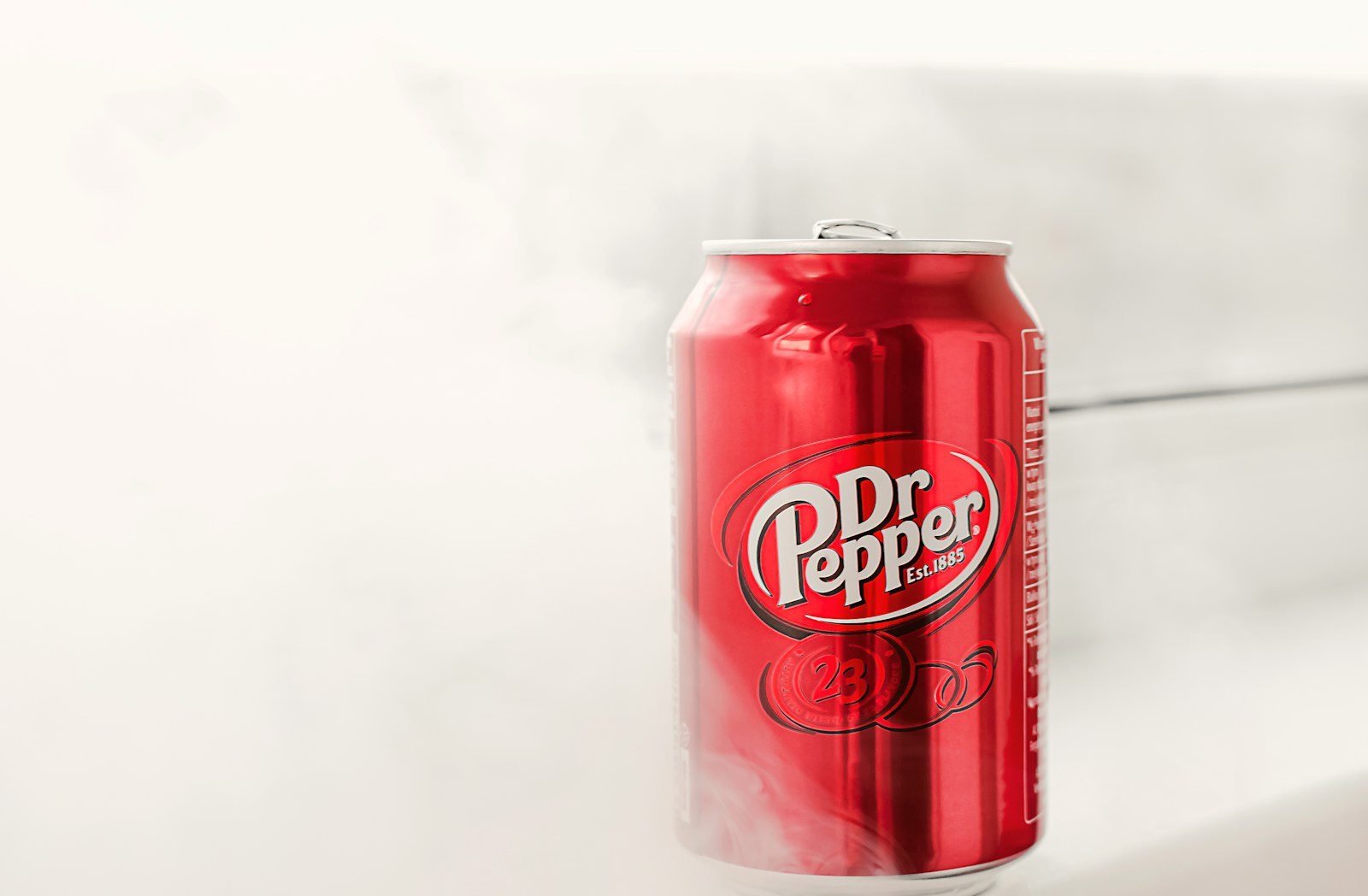 coca cola can on white surface