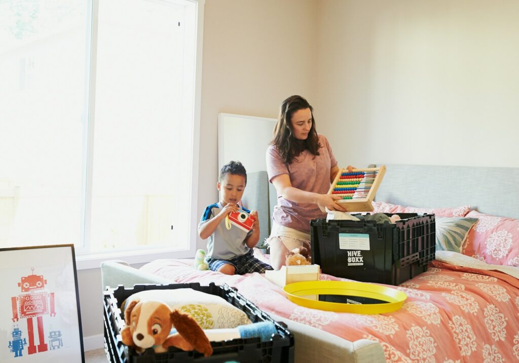 woman in white long sleeve shirt sitting beside woman in white long sleeve shirt