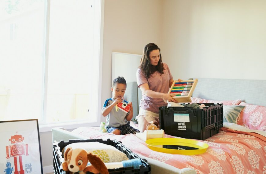 woman in white long sleeve shirt sitting beside woman in white long sleeve shirt