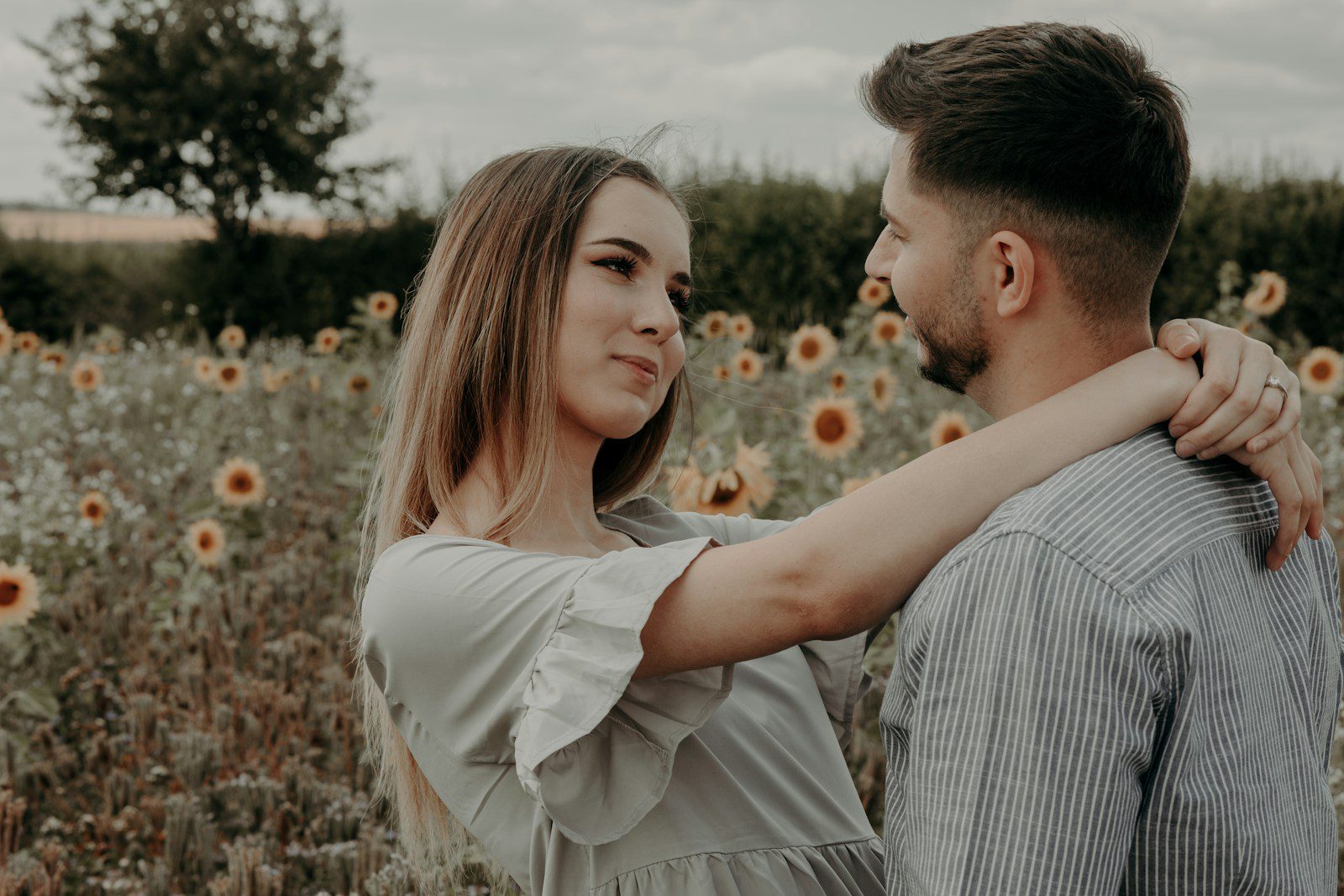 a man and woman kissing