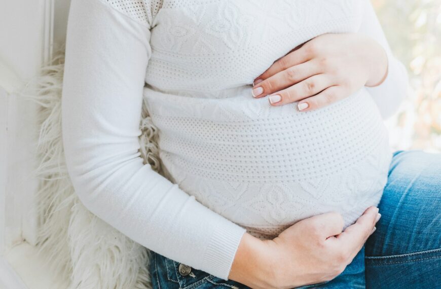 woman in white long sleeve shirt