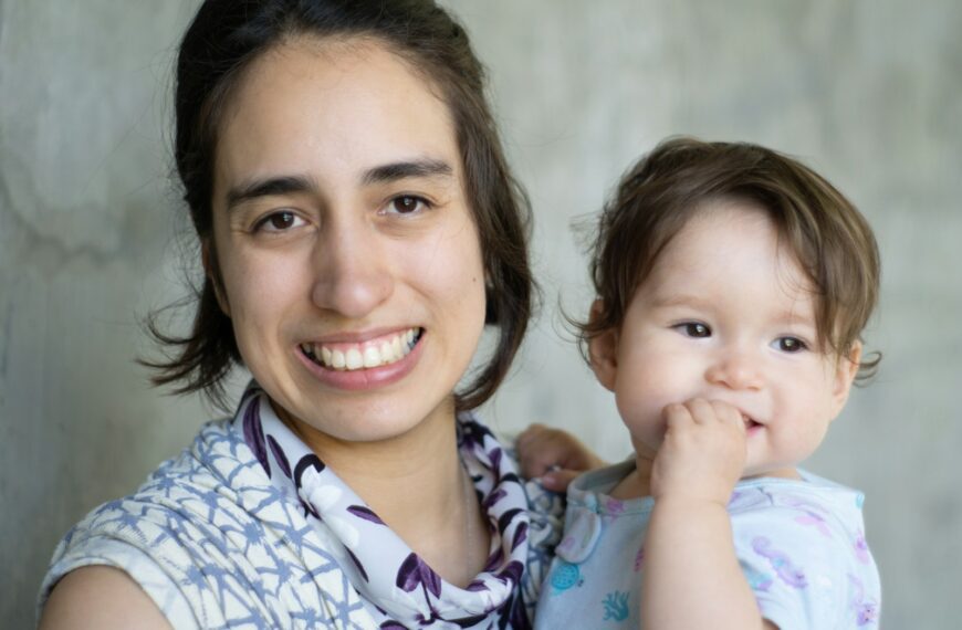 a person holding a baby