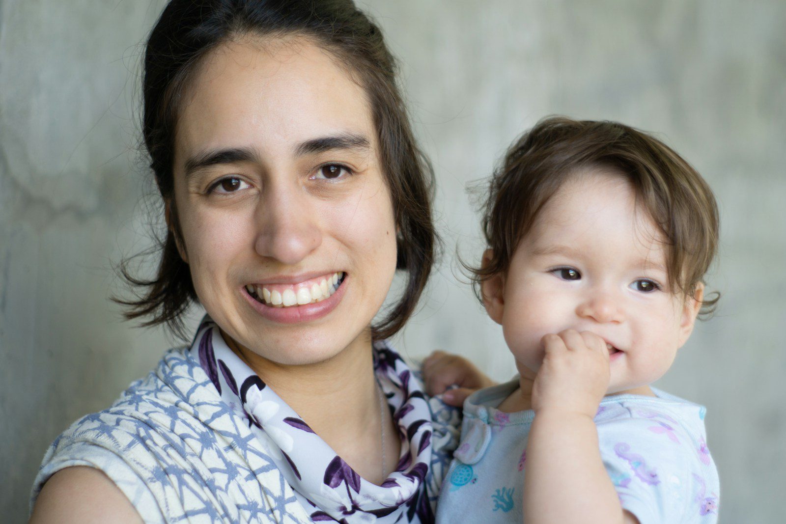a person holding a baby