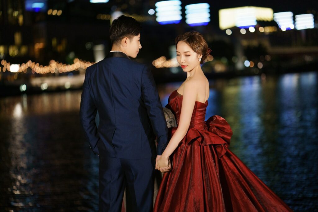 a man and a woman standing next to each other