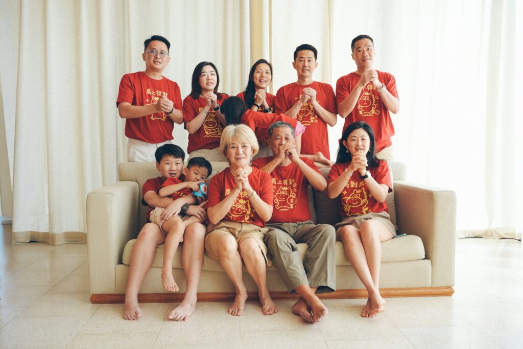 A multi-generational family poses for a photo