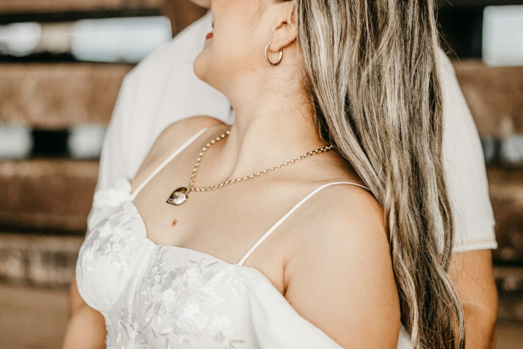 a woman wearing a white dress