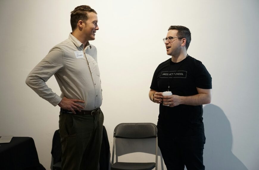 folding chair between two men