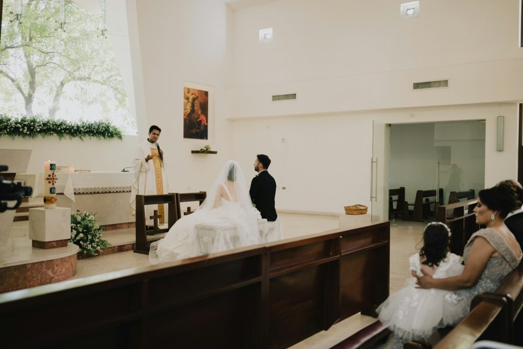 Wedding ceremony in a church with bride and groom.