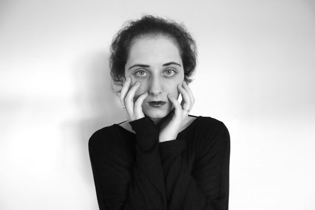 a woman with a surprised look on her face