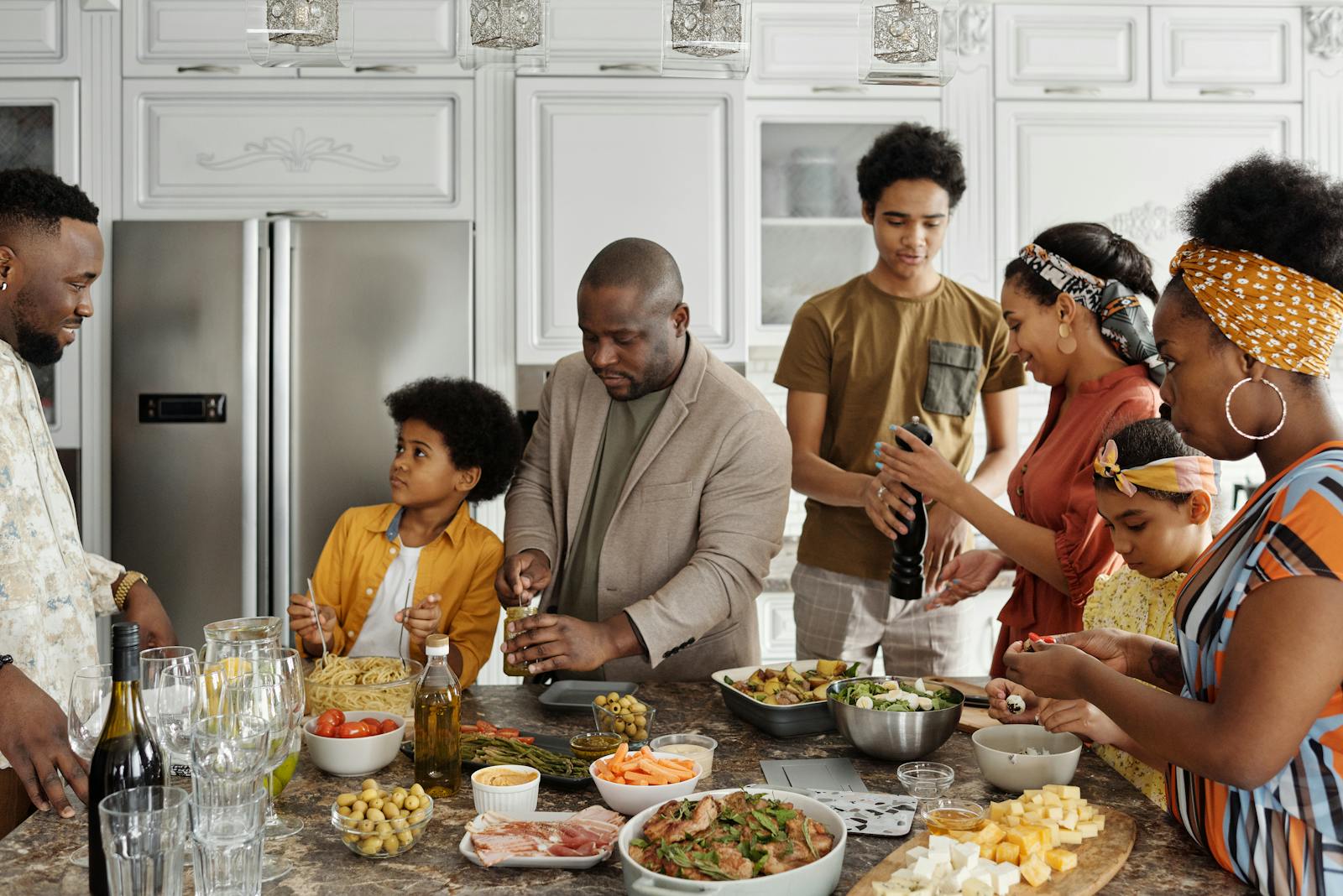 Family preparing a meal together in a lively kitchen setting, capturing joy and togetherness.