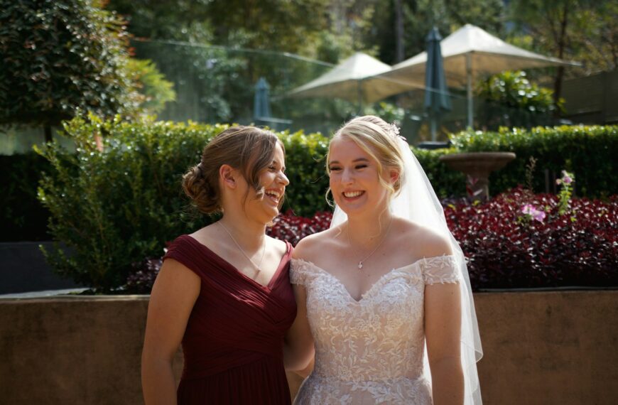a couple of women standing next to each other