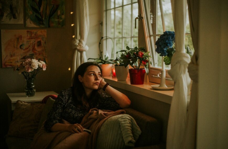 a person sitting on a couch