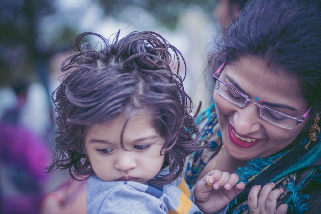 woman carrying baby
