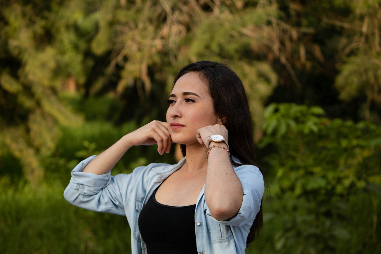 woman wearing blue denim shirt