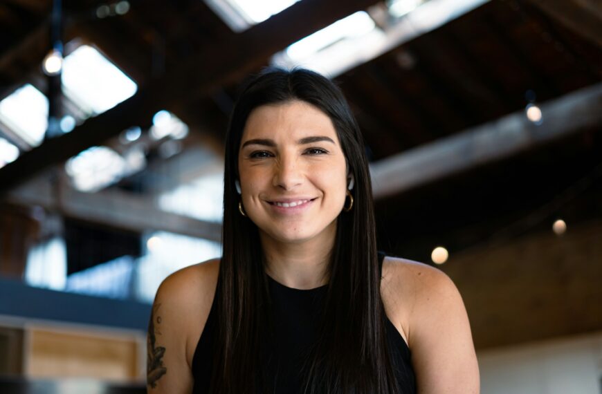 smiling woman in black tank top