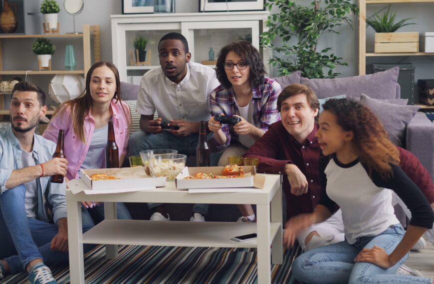 a group of people sitting around a coffee table