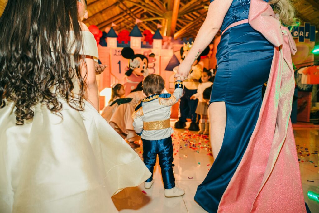 Children in costumes at a disney-themed party