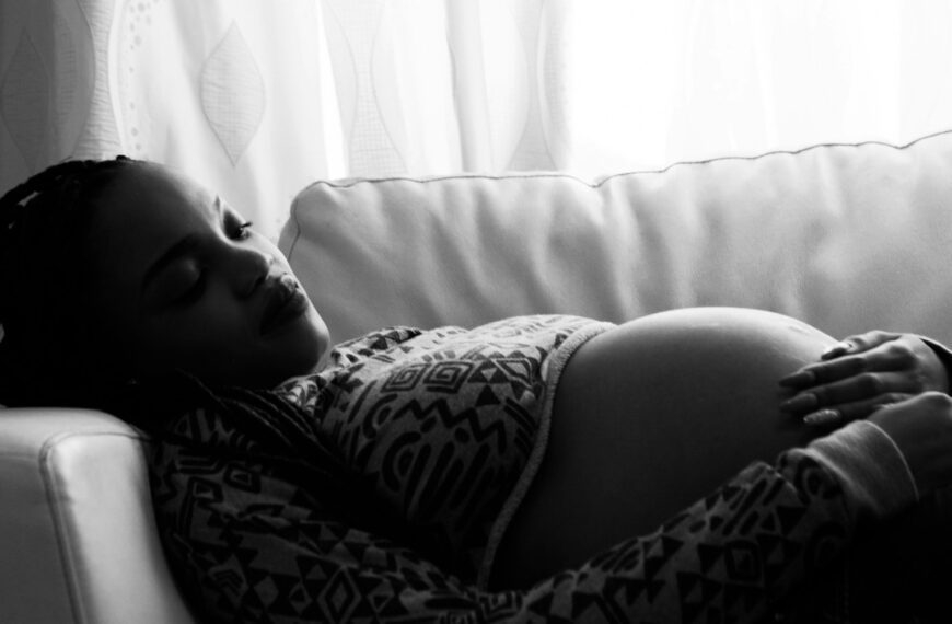 pregnant woman lying on the sofa