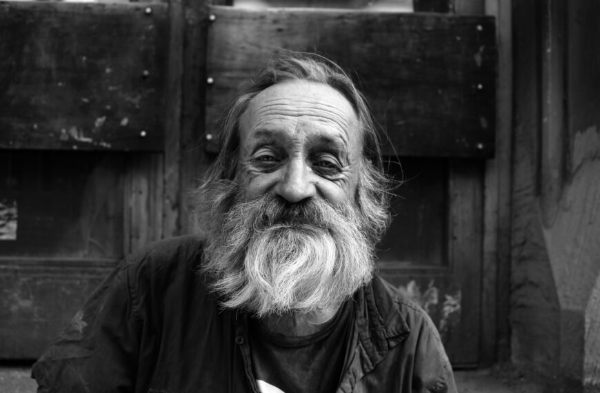 grayscale photography of man's portrait