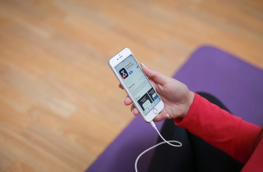 woman holding iPhone