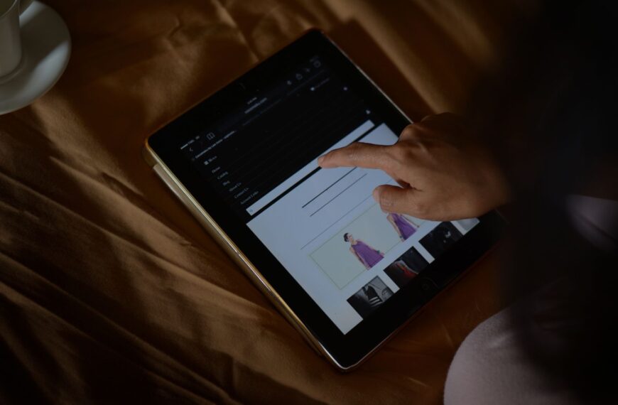 A woman browses an online shopping site on a tablet. Perfect for ecommerce and technology themes.