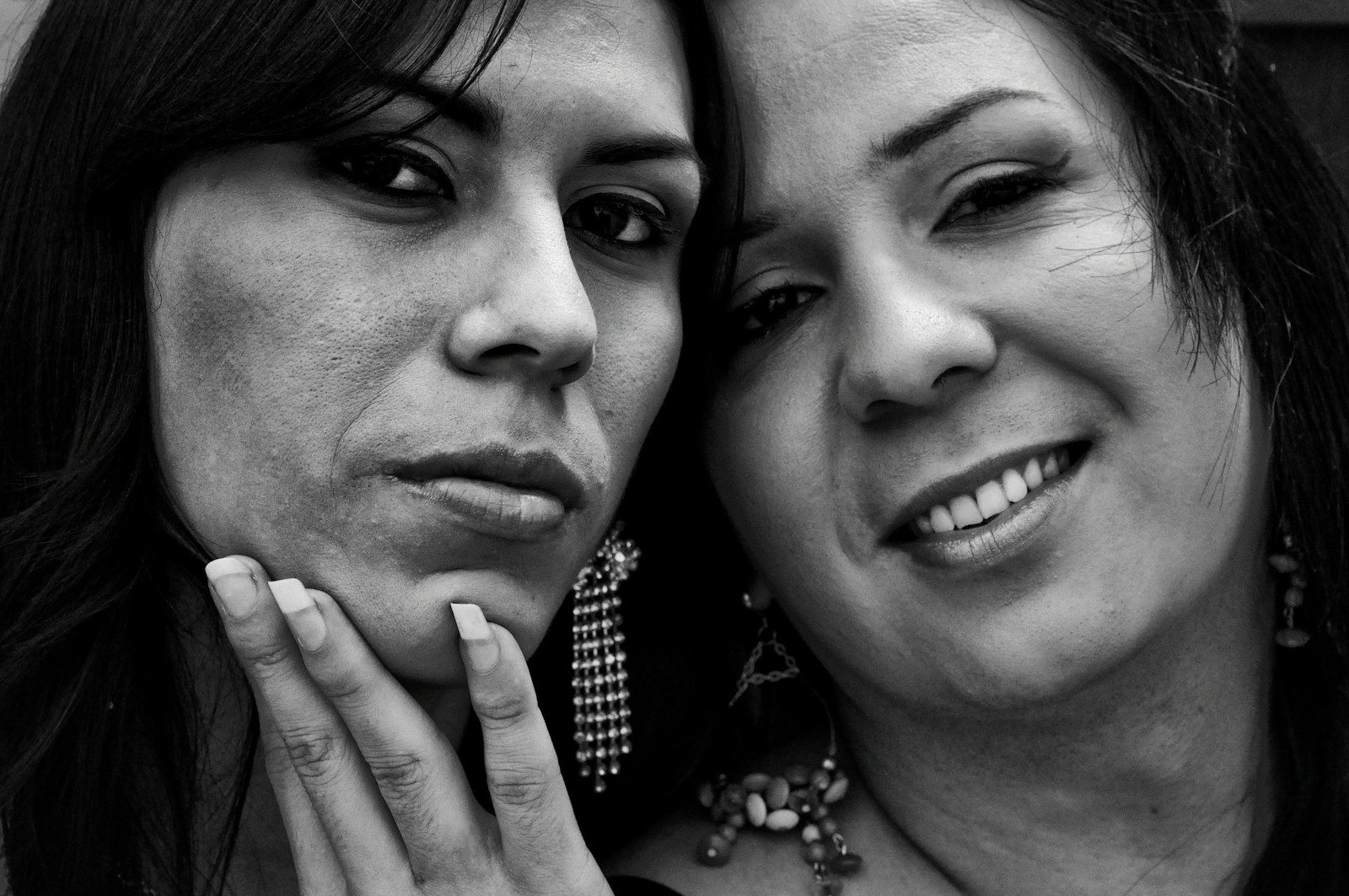 grayscale photography of two women