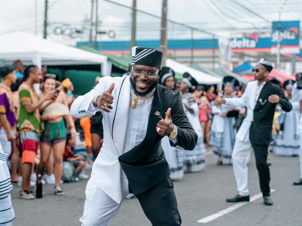 Vibrant celebration of Afro culture at a street parade in Limón, Costa Rica.