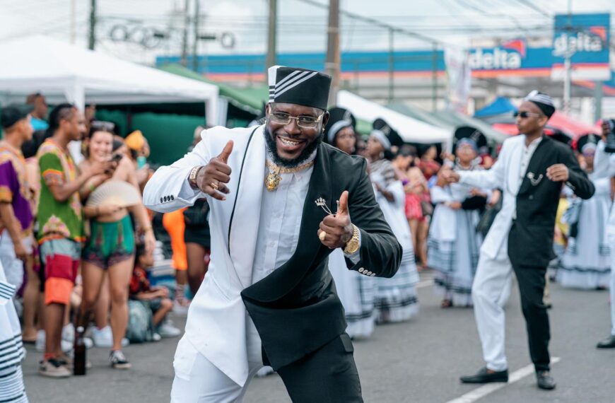 Vibrant celebration of Afro culture at a street parade in Limón, Costa Rica.