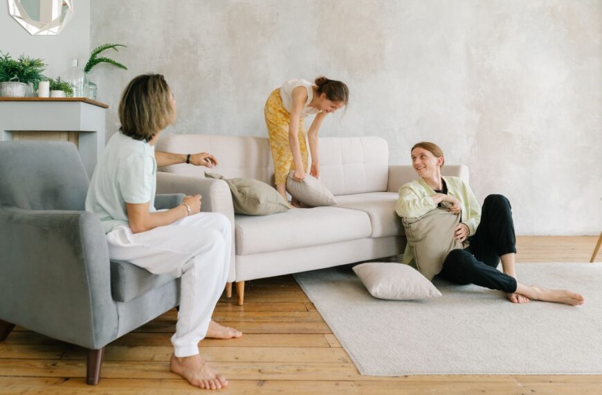 A family enjoying playful times in a chic living room, emphasizing warmth and connection.