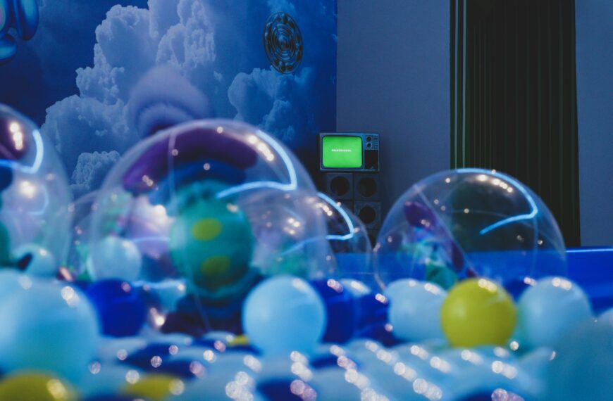 a room filled with lots of clear balls