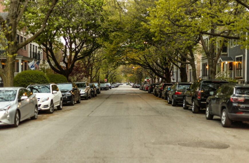 cars parked on side of the road during daytime