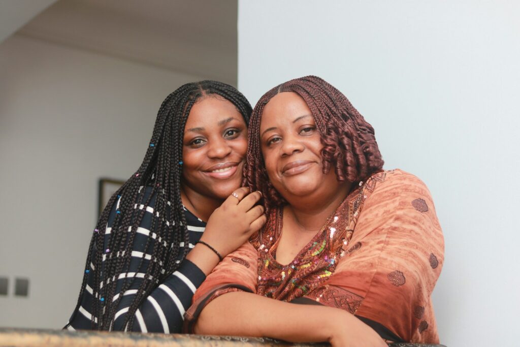 a couple of women standing next to each other