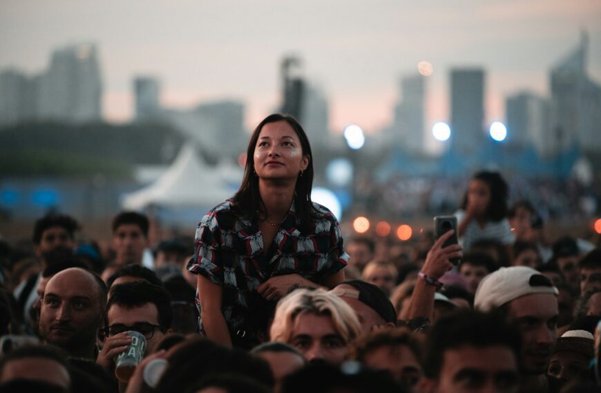 a person standing in a crowd