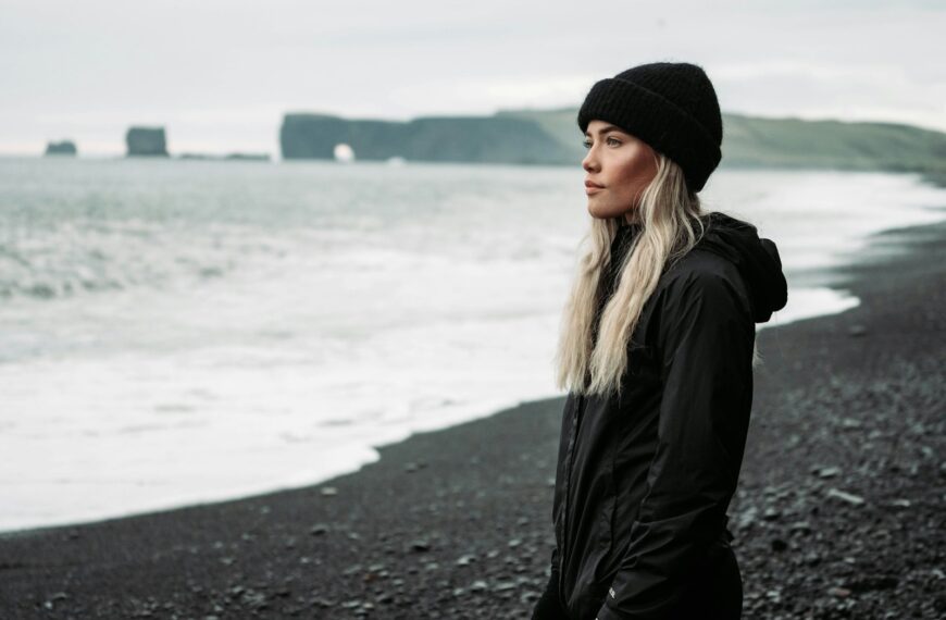 man wears black knit cap