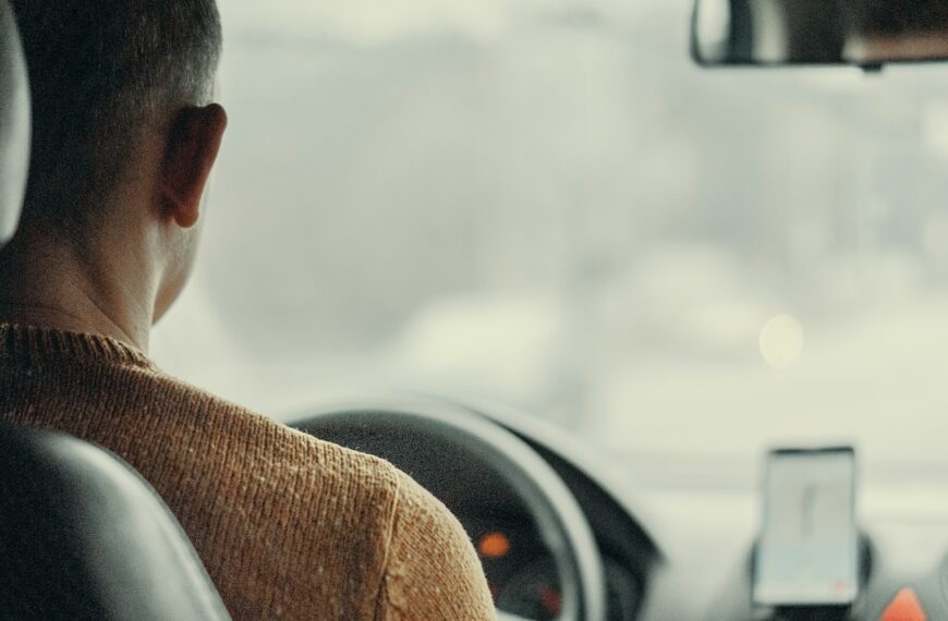 man driving vehicle