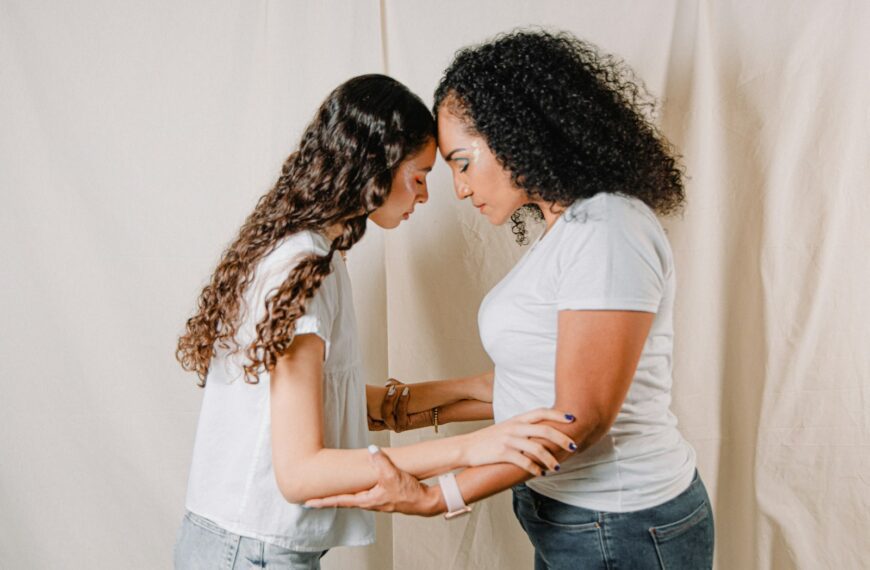 a person holding a person's hand