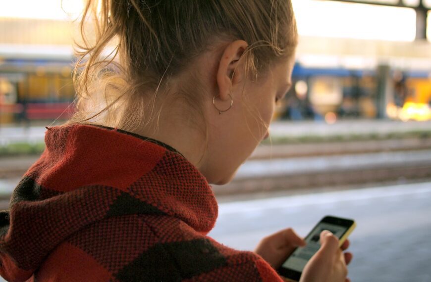 woman holding phone