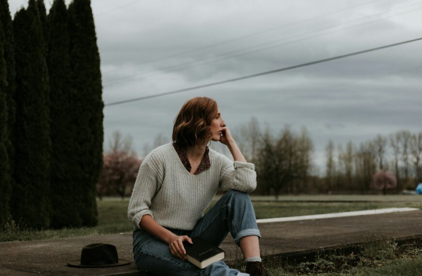 woman sitting on ground