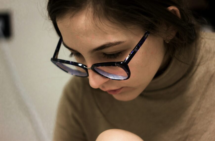 woman in black framed eyeglasses