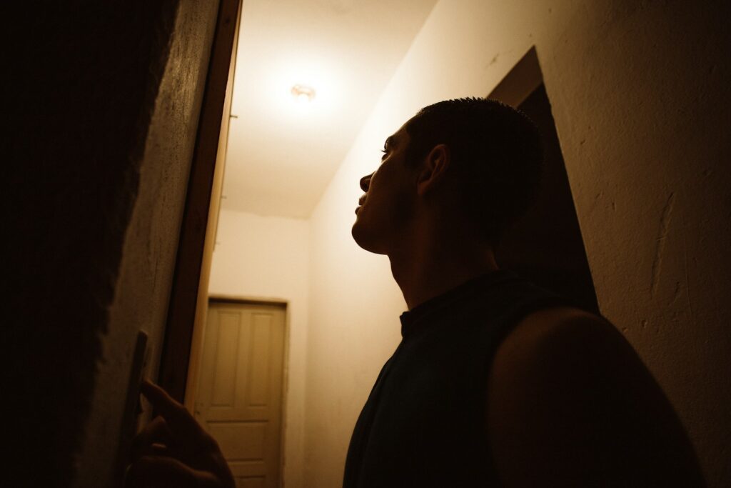 man in black tank top
