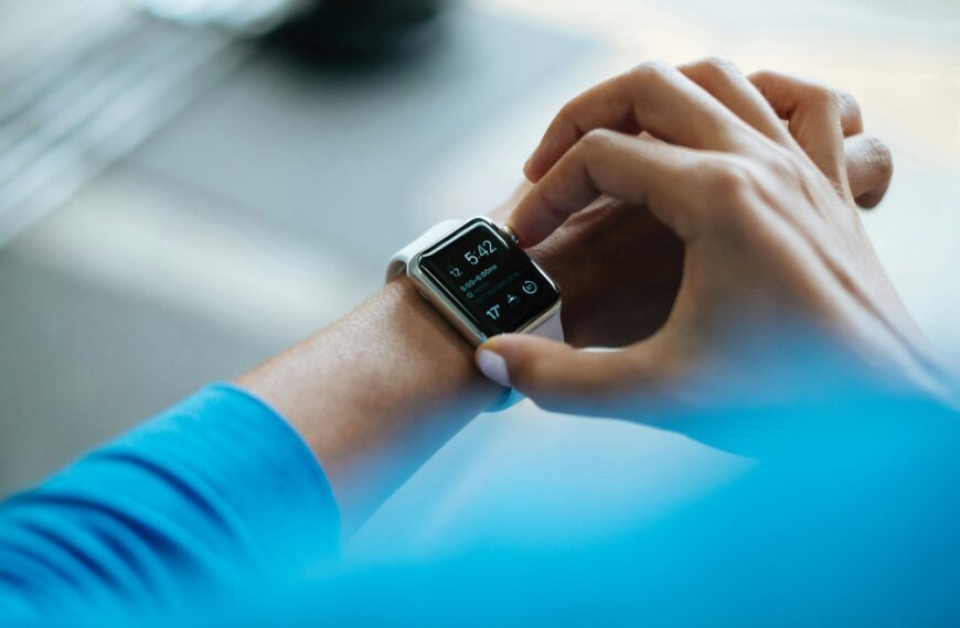 person clicking Apple Watch smartwatch