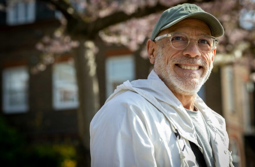 a man wearing a hat and glasses