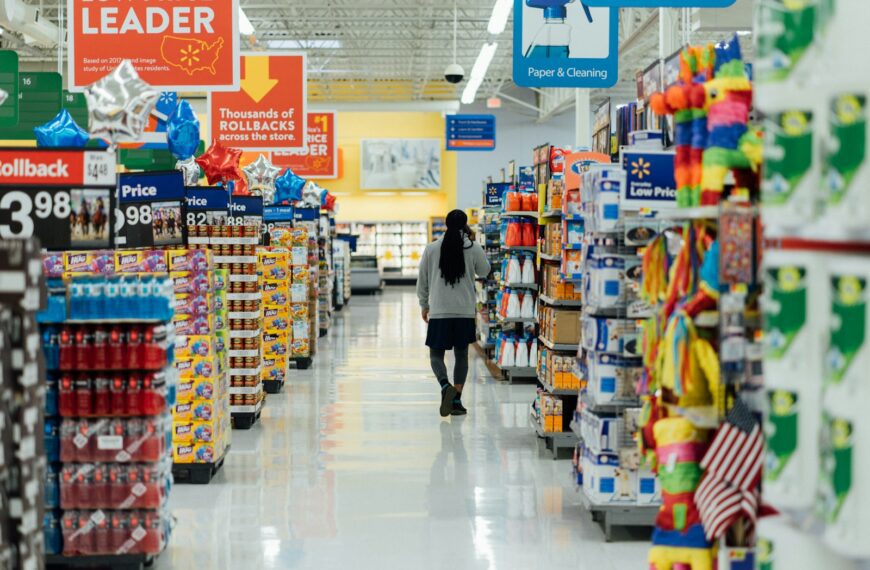person standing between shelvings