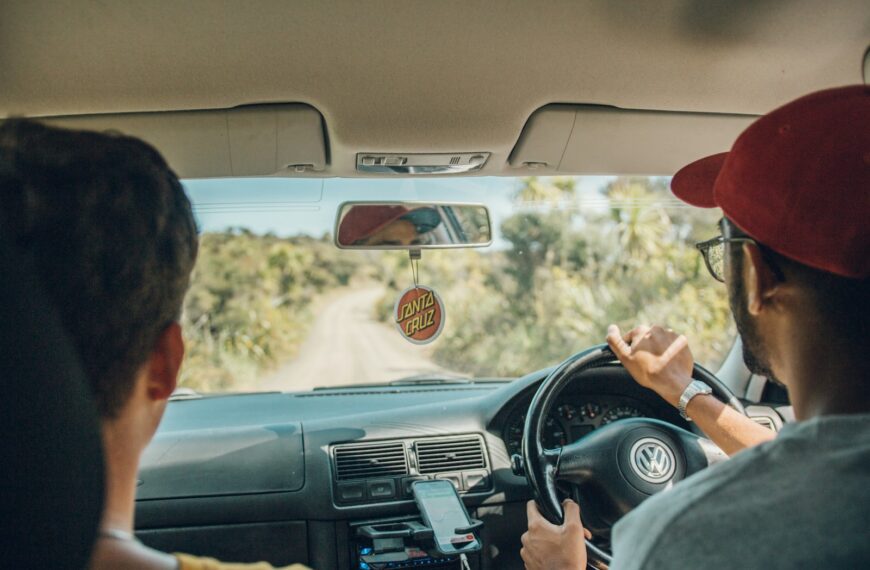 two men inside car
