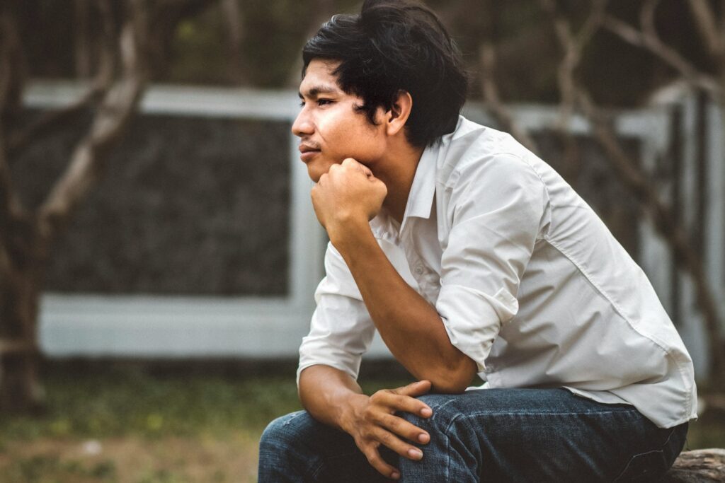 man sitting on bench