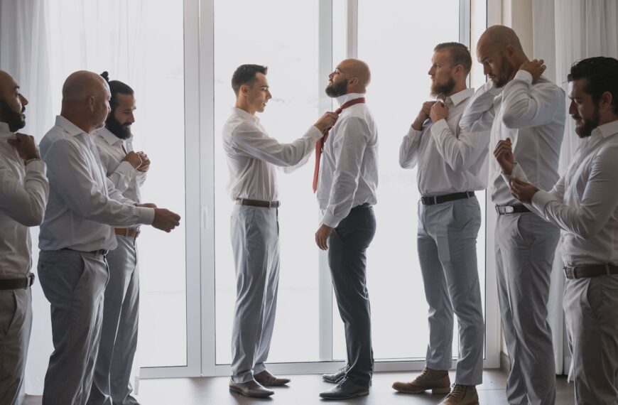 a group of men standing next to each other