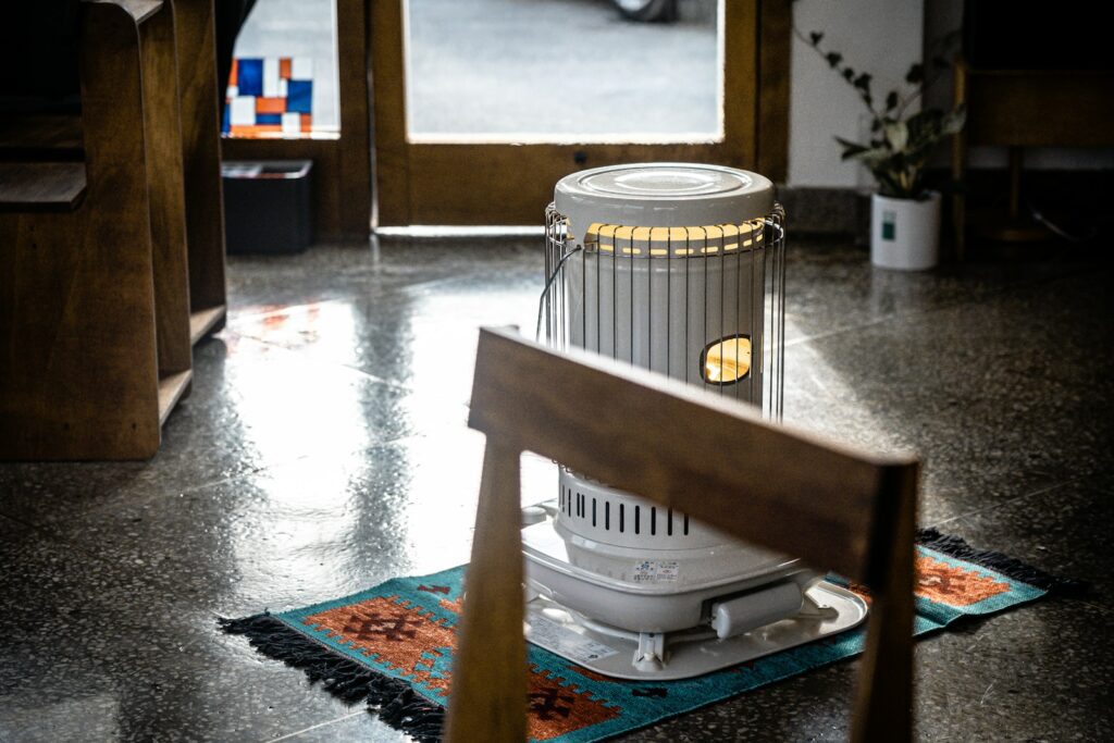 a metal cage on a rug