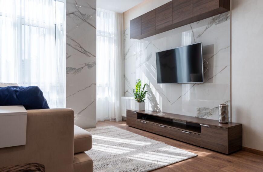 Cozy modern living room featuring wooden furniture and a comfortable couch