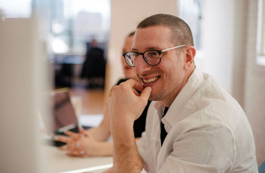 man smiling in room